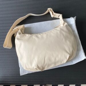 Lo & Sons Leather Ivory Aoyama Convertible Crescent Bag